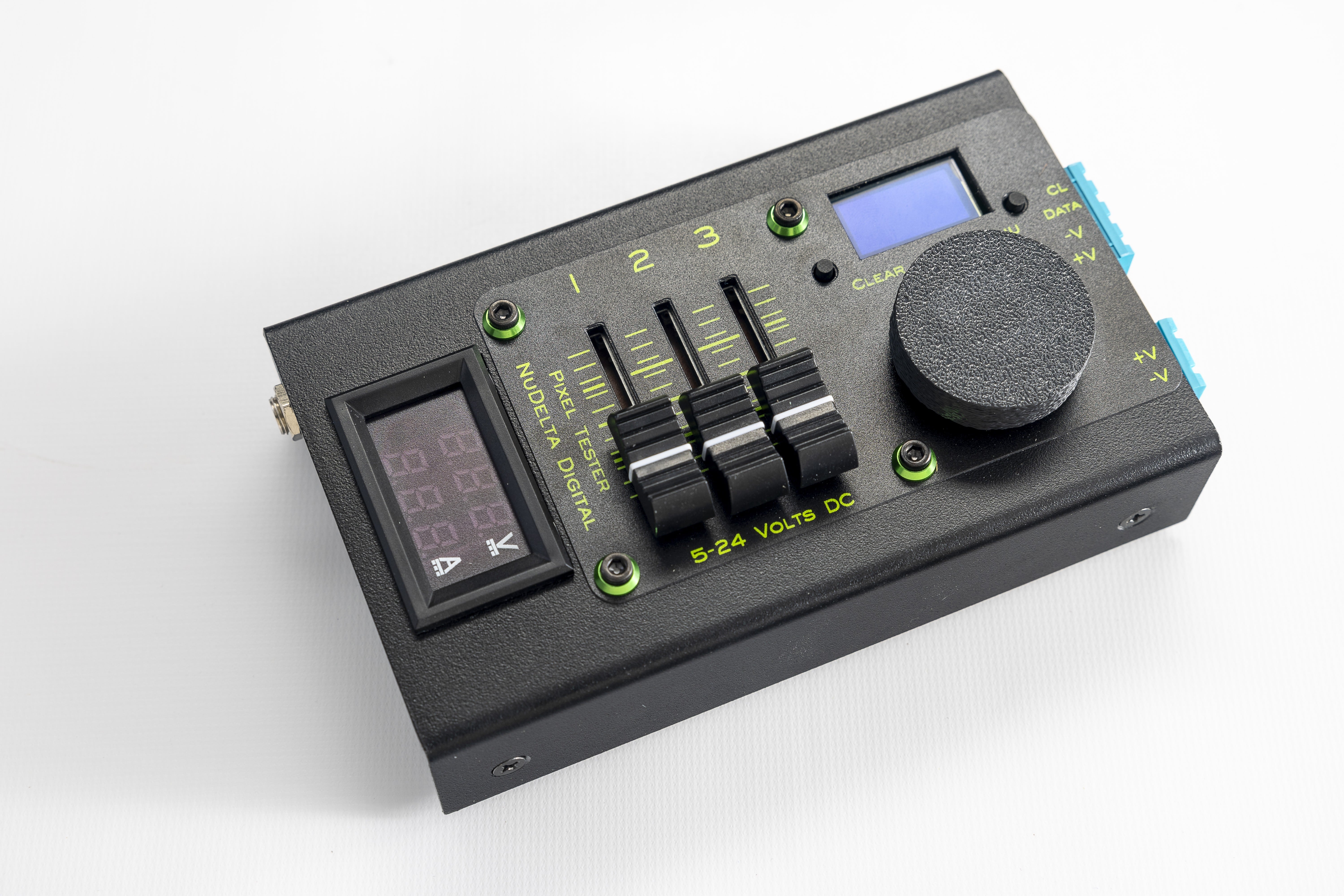 A picture of the DXT-1 DMX Tester with the screen illuminated showing that it is transmitting DMX